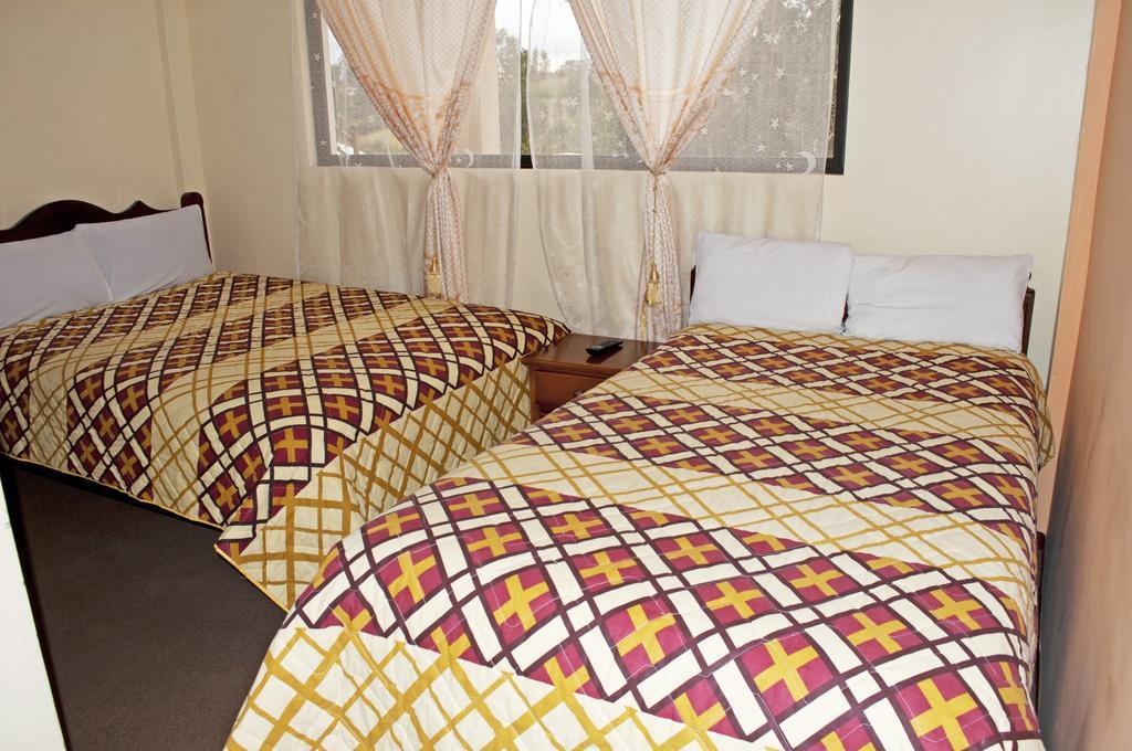 Hotel Residencial El Viajero Tababela Habitación foto